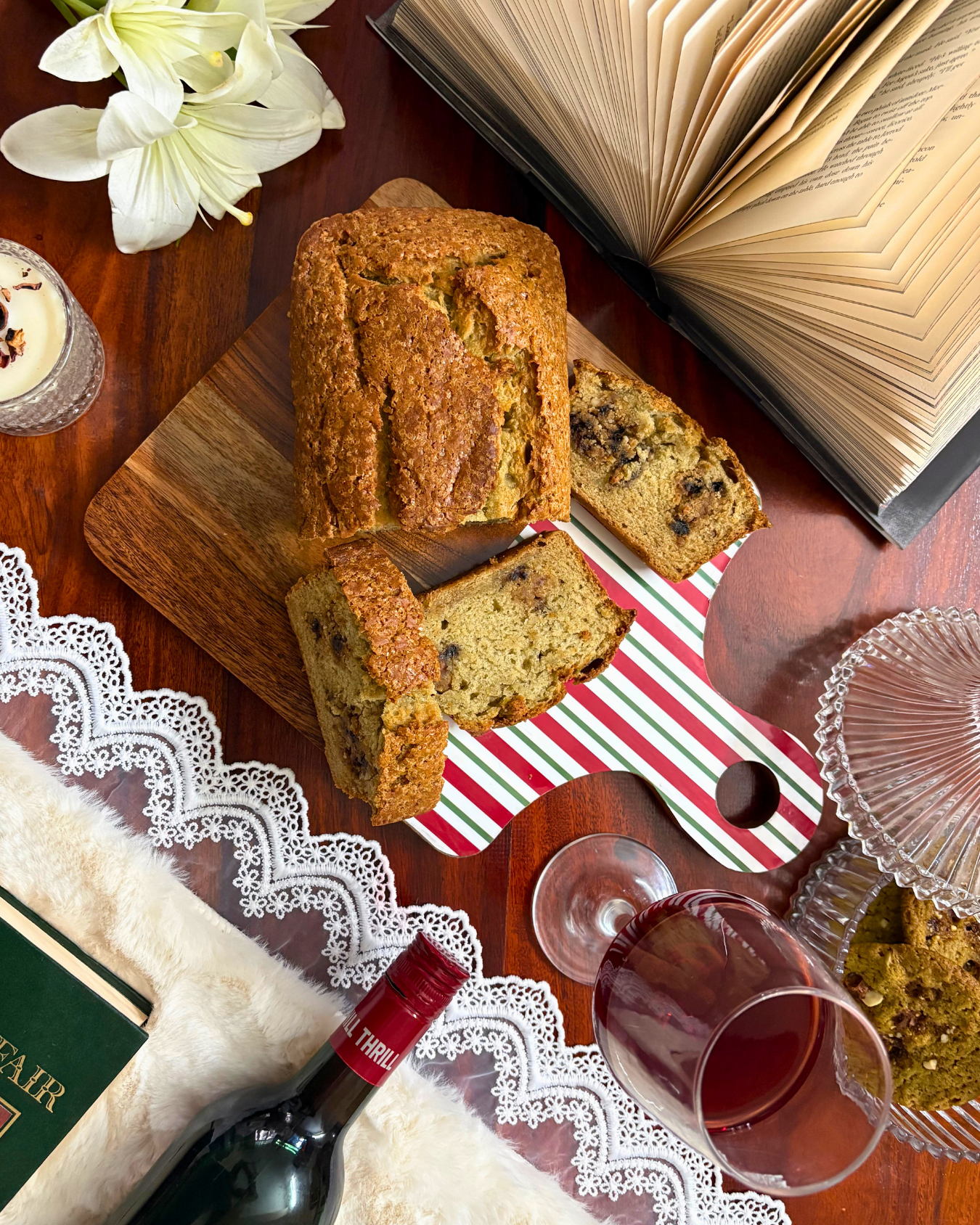 Banana Cookie Melt sliced loaf with chocolate chips and an open book